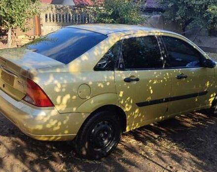 Желтый Форд Фокус, объемом двигателя 1.8 л и пробегом 325 тыс. км за 1900 $, фото 7 на Automoto.ua