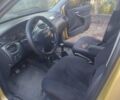 Желтый Форд Фокус, объемом двигателя 1.8 л и пробегом 325 тыс. км за 1900 $, фото 14 на Automoto.ua
