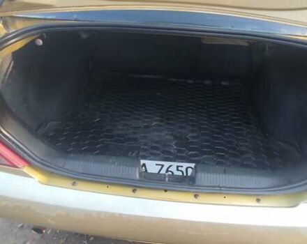 Желтый Форд Фокус, объемом двигателя 1.8 л и пробегом 325 тыс. км за 1900 $, фото 13 на Automoto.ua