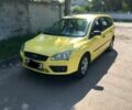 Жовтий Форд Фокус, об'ємом двигуна 1.6 л та пробігом 254 тис. км за 6000 $, фото 1 на Automoto.ua