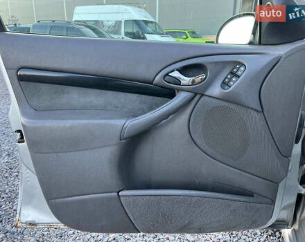 Серый Форд Фокус, объемом двигателя 1.8 л и пробегом 296 тыс. км за 2690 $, фото 14 на Automoto.ua