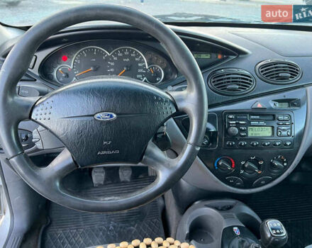 Серый Форд Фокус, объемом двигателя 1.8 л и пробегом 296 тыс. км за 2690 $, фото 20 на Automoto.ua