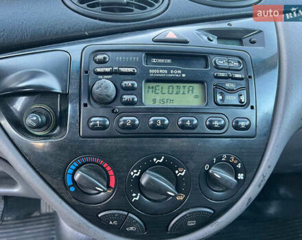 Серый Форд Фокус, объемом двигателя 1.8 л и пробегом 296 тыс. км за 2690 $, фото 25 на Automoto.ua