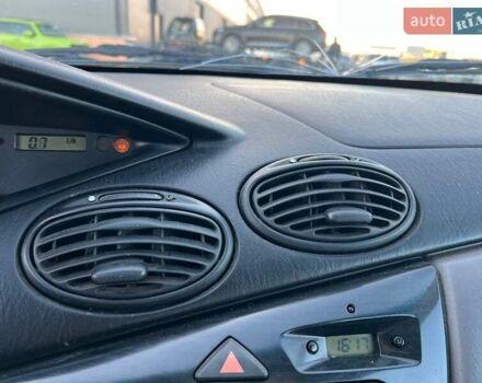 Серый Форд Фокус, объемом двигателя 1.8 л и пробегом 296 тыс. км за 2690 $, фото 24 на Automoto.ua