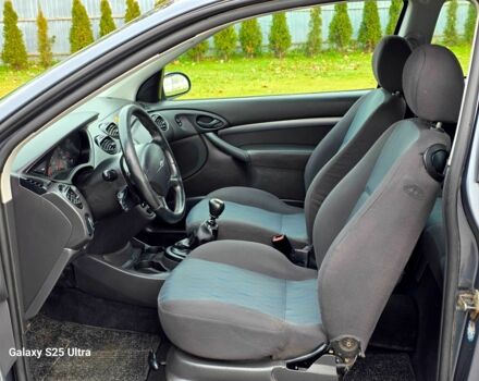 Серый Форд Фокус, объемом двигателя 1.8 л и пробегом 275 тыс. км за 1999 $, фото 21 на Automoto.ua