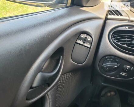 Серый Форд Фокус, объемом двигателя 1.8 л и пробегом 205 тыс. км за 4750 $, фото 8 на Automoto.ua