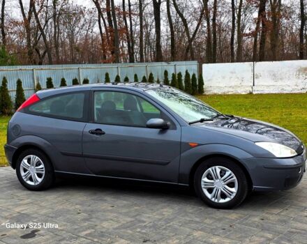 Серый Форд Фокус, объемом двигателя 1.8 л и пробегом 275 тыс. км за 1999 $, фото 2 на Automoto.ua