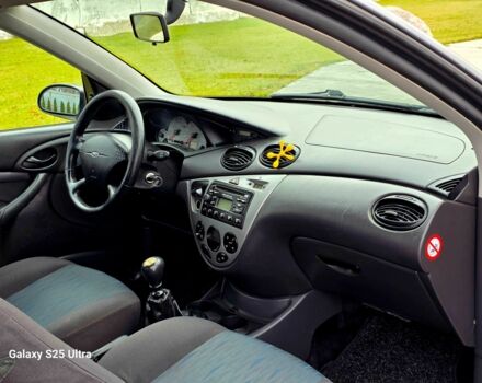 Серый Форд Фокус, объемом двигателя 1.8 л и пробегом 275 тыс. км за 1999 $, фото 8 на Automoto.ua