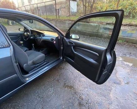 Серый Форд Фокус, объемом двигателя 1.8 л и пробегом 327 тыс. км за 3500 $, фото 10 на Automoto.ua