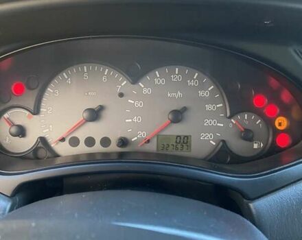 Серый Форд Фокус, объемом двигателя 1.8 л и пробегом 327 тыс. км за 3500 $, фото 13 на Automoto.ua