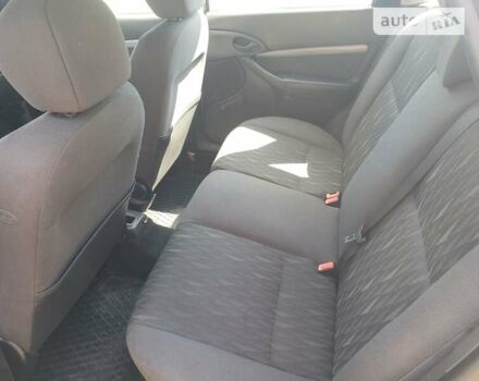 Серый Форд Фокус, объемом двигателя 1.8 л и пробегом 205 тыс. км за 4750 $, фото 24 на Automoto.ua