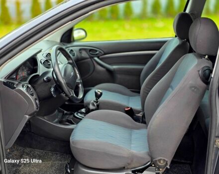 Серый Форд Фокус, объемом двигателя 1.8 л и пробегом 275 тыс. км за 1999 $, фото 20 на Automoto.ua