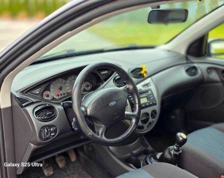 Серый Форд Фокус, объемом двигателя 1.8 л и пробегом 275 тыс. км за 1999 $, фото 19 на Automoto.ua