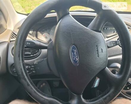 Серый Форд Фокус, объемом двигателя 1.8 л и пробегом 205 тыс. км за 4750 $, фото 9 на Automoto.ua