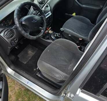 Серый Форд Фокус, объемом двигателя 1.8 л и пробегом 290 тыс. км за 2700 $, фото 4 на Automoto.ua