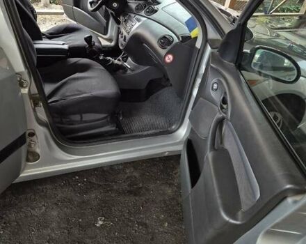 Серый Форд Фокус, объемом двигателя 1.8 л и пробегом 180 тыс. км за 3000 $, фото 11 на Automoto.ua