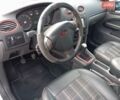 Сірий Форд Фокус, об'ємом двигуна 1.6 л та пробігом 235 тис. км за 5299 $, фото 7 на Automoto.ua