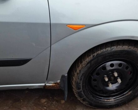 Серый Форд Фокус, объемом двигателя 1.8 л и пробегом 300 тыс. км за 961 $, фото 6 на Automoto.ua