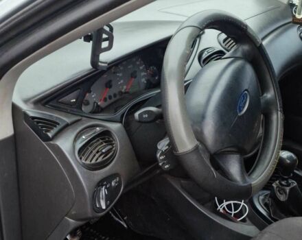 Серый Форд Фокус, объемом двигателя 1.8 л и пробегом 300 тыс. км за 961 $, фото 2 на Automoto.ua