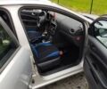 Сірий Форд Фокус, об'ємом двигуна 2 л та пробігом 238 тис. км за 5459 $, фото 2 на Automoto.ua