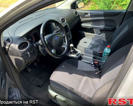 Серый Форд Фокус, объемом двигателя 1.6 л и пробегом 293 тыс. км за 5100 $, фото 7 на Automoto.ua