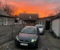 Серый Форд Фокус, объемом двигателя 1.6 л и пробегом 424 тыс. км за 3500 $, фото 2 на Automoto.ua