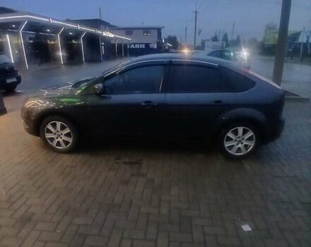 Серый Форд Фокус, объемом двигателя 1.6 л и пробегом 297 тыс. км за 4800 $, фото 6 на Automoto.ua