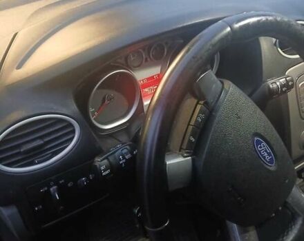 Серый Форд Фокус, объемом двигателя 1.6 л и пробегом 297 тыс. км за 4800 $, фото 4 на Automoto.ua