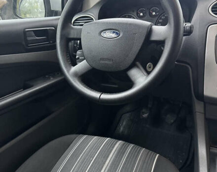 Серый Форд Фокус, объемом двигателя 1.39 л и пробегом 228 тыс. км за 3999 $, фото 19 на Automoto.ua