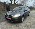 Серый Форд Фокус, объемом двигателя 1.6 л и пробегом 150 тыс. км за 5800 $, фото 1 на Automoto.ua