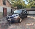 Сірий Форд Фокус, об'ємом двигуна 1.4 л та пробігом 88 тис. км за 6109 $, фото 1 на Automoto.ua