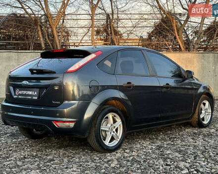 Серый Форд Фокус, объемом двигателя 1.4 л и пробегом 220 тыс. км за 5790 $, фото 6 на Automoto.ua