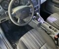 Сірий Форд Фокус, об'ємом двигуна 1.4 л та пробігом 209 тис. км за 4700 $, фото 17 на Automoto.ua