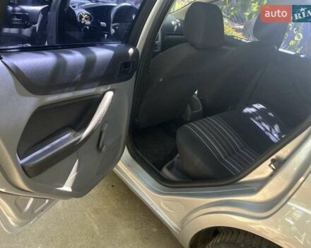 Серый Форд Фокус, объемом двигателя 1.4 л и пробегом 251 тыс. км за 4999 $, фото 7 на Automoto.ua