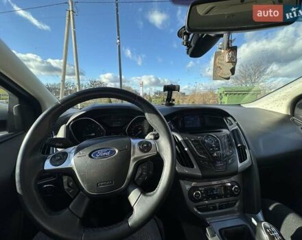 Серый Форд Фокус, объемом двигателя 1.56 л и пробегом 225 тыс. км за 8500 $, фото 12 на Automoto.ua