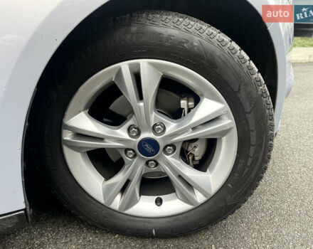 Сірий Форд Фокус, об'ємом двигуна 1 л та пробігом 129 тис. км за 6499 $, фото 9 на Automoto.ua