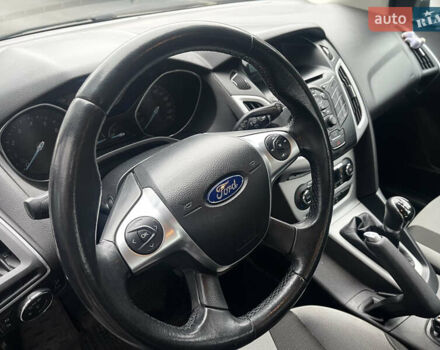Сірий Форд Фокус, об'ємом двигуна 1 л та пробігом 129 тис. км за 6499 $, фото 27 на Automoto.ua