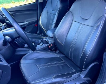 Сірий Форд Фокус, об'ємом двигуна 2 л та пробігом 218 тис. км за 6999 $, фото 5 на Automoto.ua