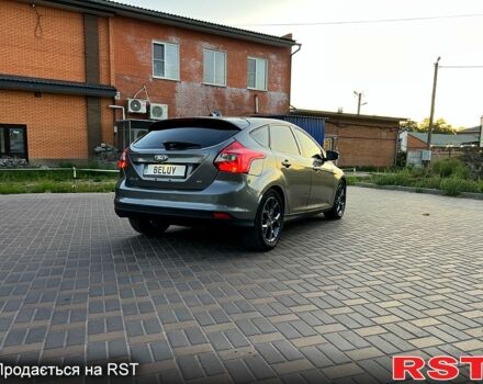 Сірий Форд Фокус, об'ємом двигуна 2 л та пробігом 218 тис. км за 6999 $, фото 4 на Automoto.ua