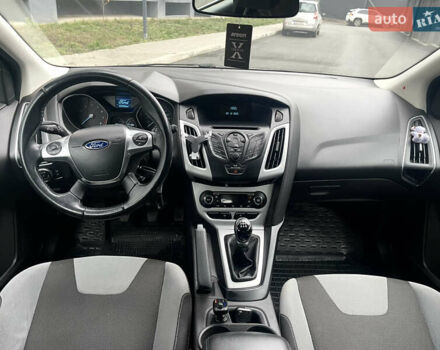 Сірий Форд Фокус, об'ємом двигуна 1 л та пробігом 129 тис. км за 6499 $, фото 11 на Automoto.ua