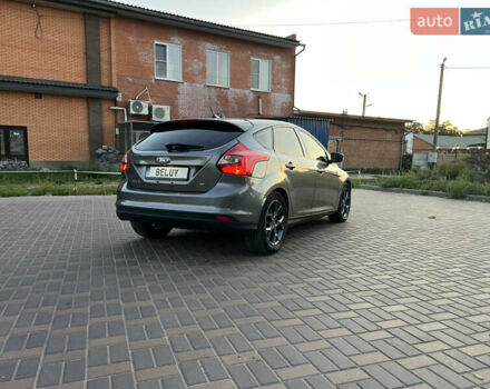 Форд Фокус 2014 в Валках на Automoto.ua Серый Форд Фокус, объемом двигателя 2 л и пробегом 218 тыс. км за 6999 $, фото 2 на Automoto.ua