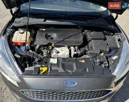 Серый Форд Фокус, объемом двигателя 1.5 л и пробегом 253 тыс. км за 9750 $, фото 19 на Automoto.ua