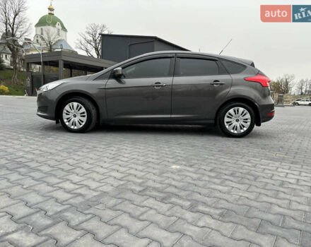 Серый Форд Фокус, объемом двигателя 1.5 л и пробегом 253 тыс. км за 9750 $, фото 1 на Automoto.ua