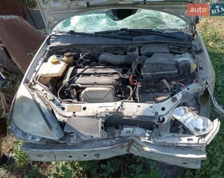 Серый Форд Фокус, объемом двигателя 1.8 л и пробегом 290 тыс. км за 1000 $, фото 5 на Automoto.ua