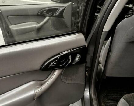 Серый Форд Фокус, объемом двигателя 1.8 л и пробегом 155 тыс. км за 2250 $, фото 9 на Automoto.ua