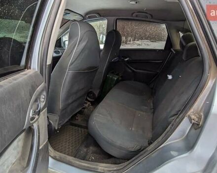 Серый Форд Фокус, объемом двигателя 1.8 л и пробегом 232 тыс. км за 3200 $, фото 9 на Automoto.ua