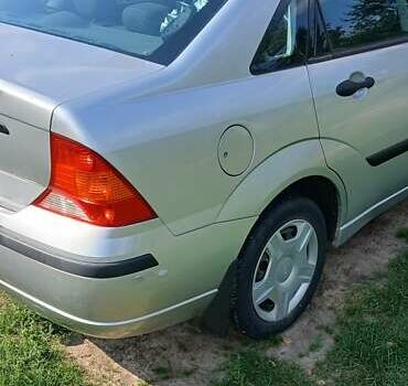 Серый Форд Фокус, объемом двигателя 1.6 л и пробегом 150 тыс. км за 3650 $, фото 7 на Automoto.ua