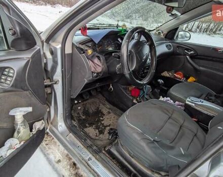 Серый Форд Фокус, объемом двигателя 1.8 л и пробегом 232 тыс. км за 3200 $, фото 7 на Automoto.ua