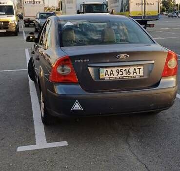 Серый Форд Фокус, объемом двигателя 1.4 л и пробегом 475 тыс. км за 3500 $, фото 1 на Automoto.ua