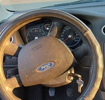 Серый Форд Фокус, объемом двигателя 1.4 л и пробегом 475 тыс. км за 3500 $, фото 10 на Automoto.ua